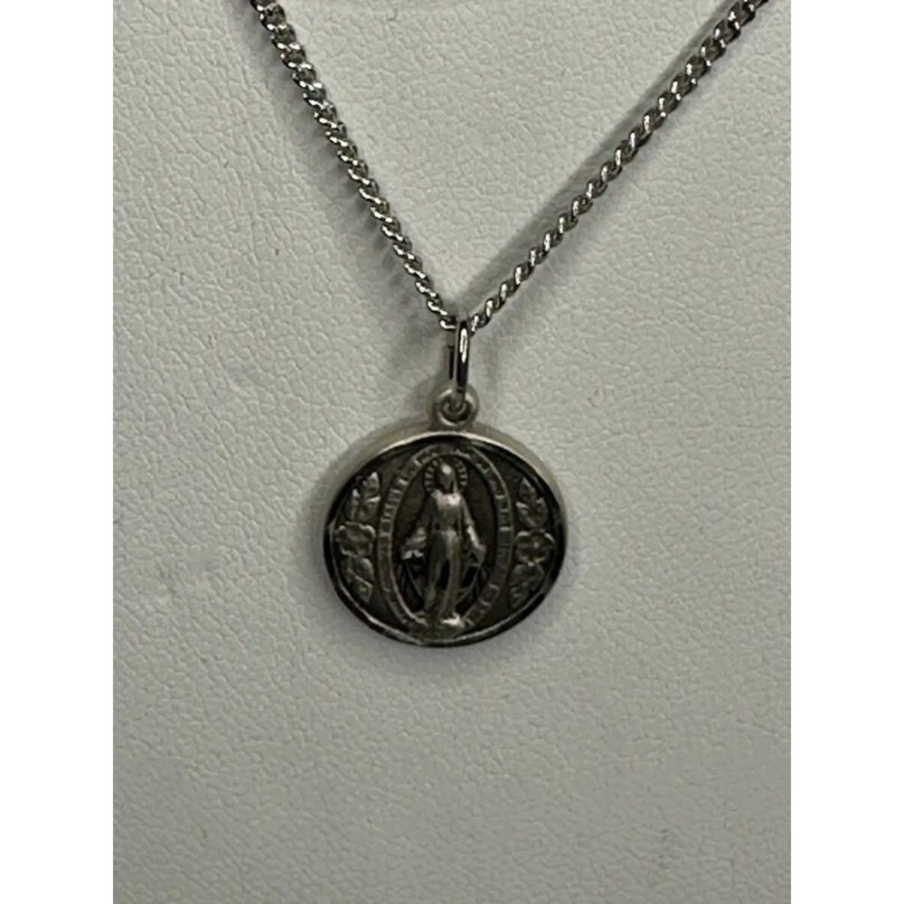 Silver toned Virgin Mary pendant
